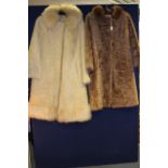 A cream Persian lamb coat, having feature sheepskin collar and hem, with a beige Persian lamb coat,