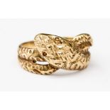 A 9ct snake ring with set eyes, size P,