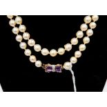 String of baroque pearls with gold/amethyst clasp