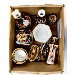 A collection of Royal Crown Derby miniatures to include, bottle vases, tea caddy, milk churn,