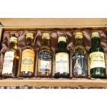 Set of six 5cl Malt whisky bottles in Harrods case of issue