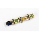 A 9ct gold, sapphire, peridot and citrine diamond pendant,