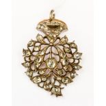 A Victorian rose metal and silver paste set pendant,