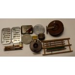 Angling interest: a collection of fishing items to include three reels, weights,