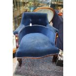 A late Victorian blue upholstered gentleman's tub chair