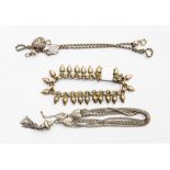 An Victorian Albertina watch chain converted to a bracelet with a tassel,