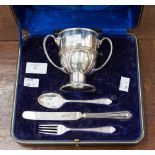 Silver Christening set, comprising drinking cup, spoon,
