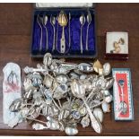 A cased part set of sterling hallmarked sugar tongs and spoons;