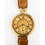 An early 20th Century ladies wristwatch in the form of a fob watch on a strap,