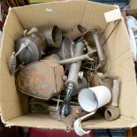 A box of assorted brass and copper ware, including kettles bowls, irons,