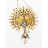 A Victorian peacock pendant, set in yellow gold metal, most likely 15ct,