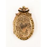 A Victorian rose metal locket,