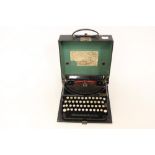 A Remington portable typewriter, circa 1936,