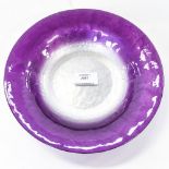 Studio glass bowl having a purple rim fading to a silver coloured centre