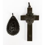 A jet carved crucifix with a jet pendant (2)