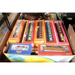 One box of assorted boxed Hornby and Bachmann rolling stock, good collection.