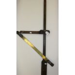 Adjustable Wooden Horse Measuring stick and a brass and leather strop.