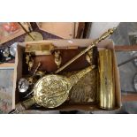 A collection of brassware, including Trench Art vase, a pair of Taper sticks, a pair of coal tongs,