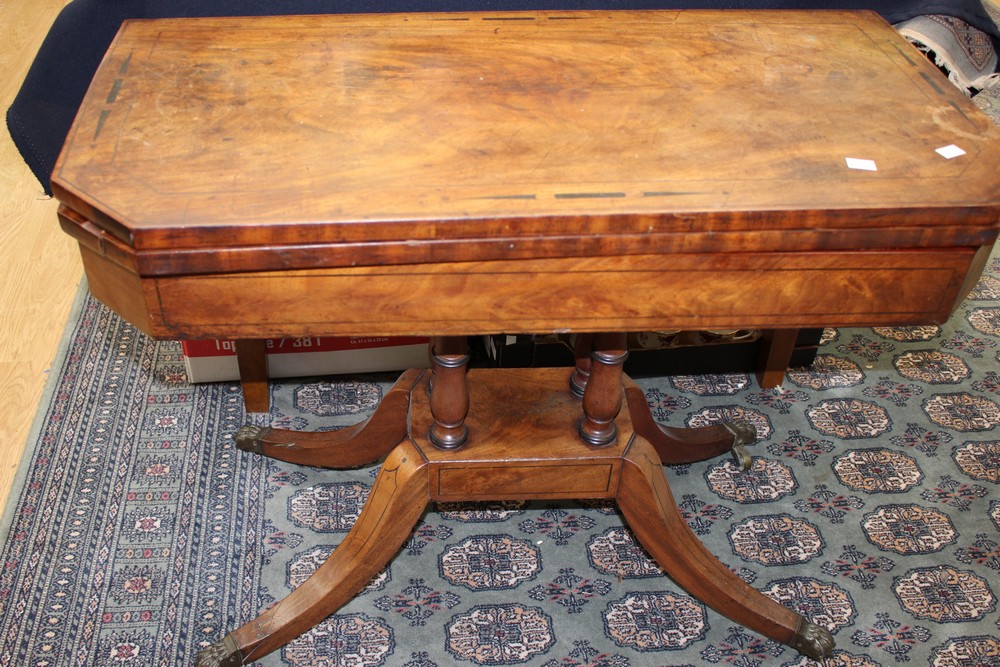 A Regency mahogany games table