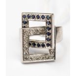 A white metal (possibl;y 18ct gold) diamond and sapphire ladies dress ring,