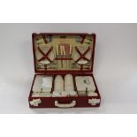 A Brexton Bandalasta picnic set, 1950s, complete with four piece place settings,