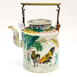 Pottery tea pot with metal handle,