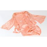 A peach silk lounging pyjama set, jacket bust 34 inches approx, sleeve length 17 inches approx,