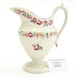 A Newhall Helmet Shaped Cream Jug with a twisted body, date circa 1800, size 11.