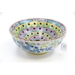 An English Delft ware Colander/ Drainer with later clobbered colourful enamel decoration,