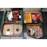 Three boxes and a case containing a collection of records