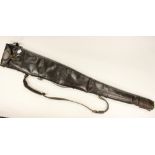 A high quality varnished brown leather sheepskin lined gun slip.