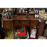 A George III style mahogany sideboard, fitted with a single drawer to centre,