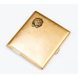A 14ct gold cigarette case with transfer lion's head to front, interior inscription 'Africa 1928,