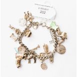 A silver charm bracelet with various enamelled and articulated charms, 1.