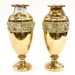 A pair of Victorian brass vases