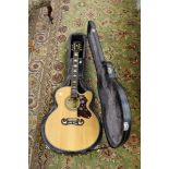 An Epiphone EJ200 CE/N electro-acoustic guitar with case.
