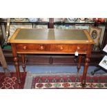 A mid Victorian mahogany washstand, having two drawers, with a later leather inset top,