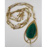 A green chalcedony quartz, pear shaped 18ct gold pendant and chain, weighing approx 28gms,