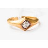 A 22ct gold single stone diamond dress ring, this a diamond shaped setting,