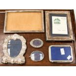 A box of four silver and two white metal picture frames (6)