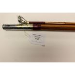 Angling interest: Fishing rod by Pegley Davies and wooden reel.