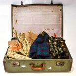 A suitcase of ladies Welsh wool tapestry including coat,