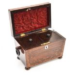 A Georgian twin caddy with walnut flower design inlay, mother of pearl key detailing,