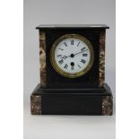 A 19th century black slate bracket clock