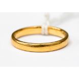 A 22ct gold wedding band, size P, with a weight approx 3..
