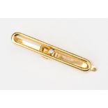 An 18ct diamond and gold lie clip,