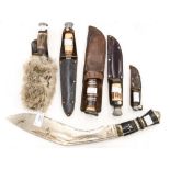 A collection of general purpose hunting knives and one Supreme throwing knife with 9cm blade.