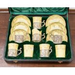 A boxed silver coffee service, Edwardian, egg shell ware,