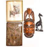 An African mask, an ebony giraffe, a print block of a stag, John Wild Bolton & Manchester,