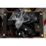 Three boxes of assorted camera cases, bags and lense caps to include, Rolleicord, Nikon, Minolta,